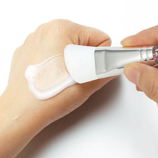 Single silicone mask brush with silicone brush soft tip