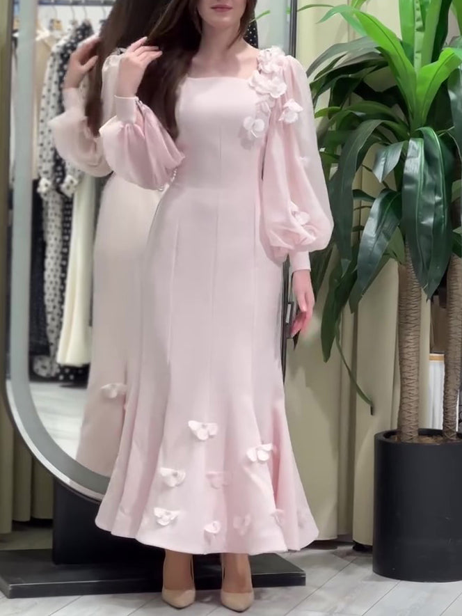 فستان أنيق بأكمام طويلة مزين بالزهور بتصميم ذيل السمكة